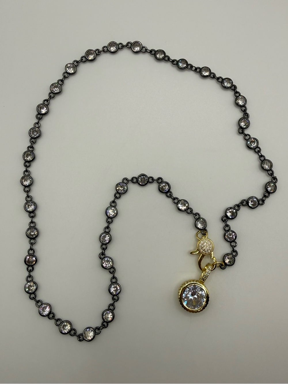 Black and Clear Crystal Station Necklace with Gold Charm- Lumi  bezel